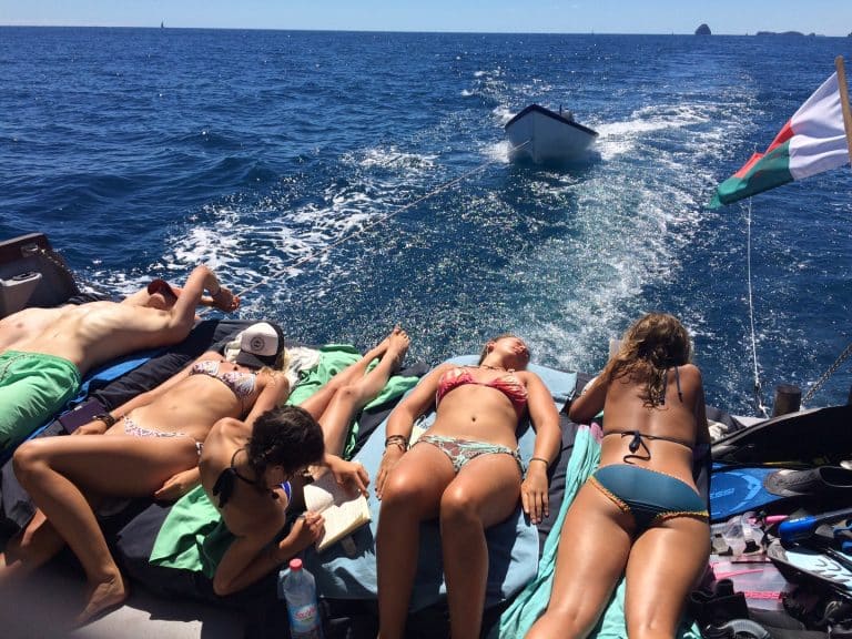 group relaxing on the Spirit of Malala Madagascar