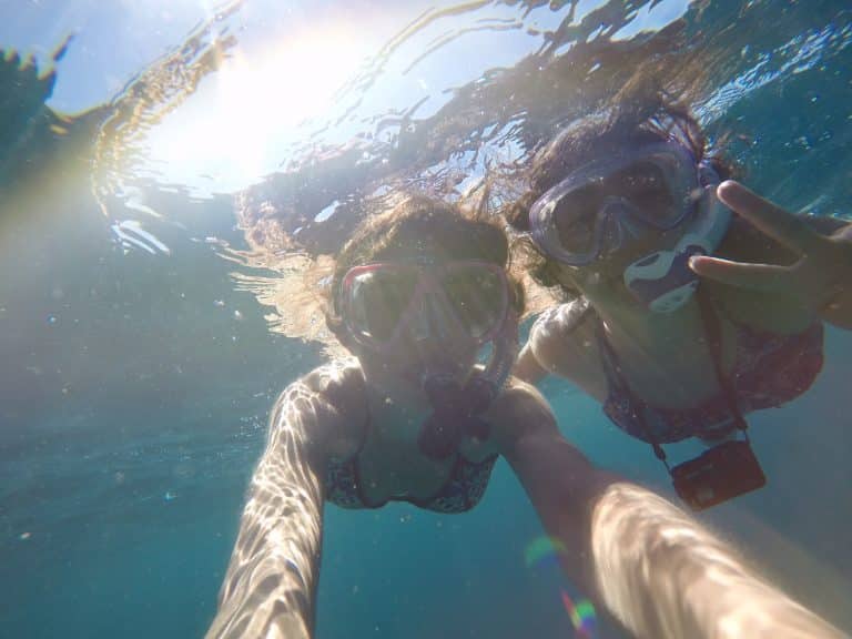 Spirit of Malala Madagascar outreach two girls underwater